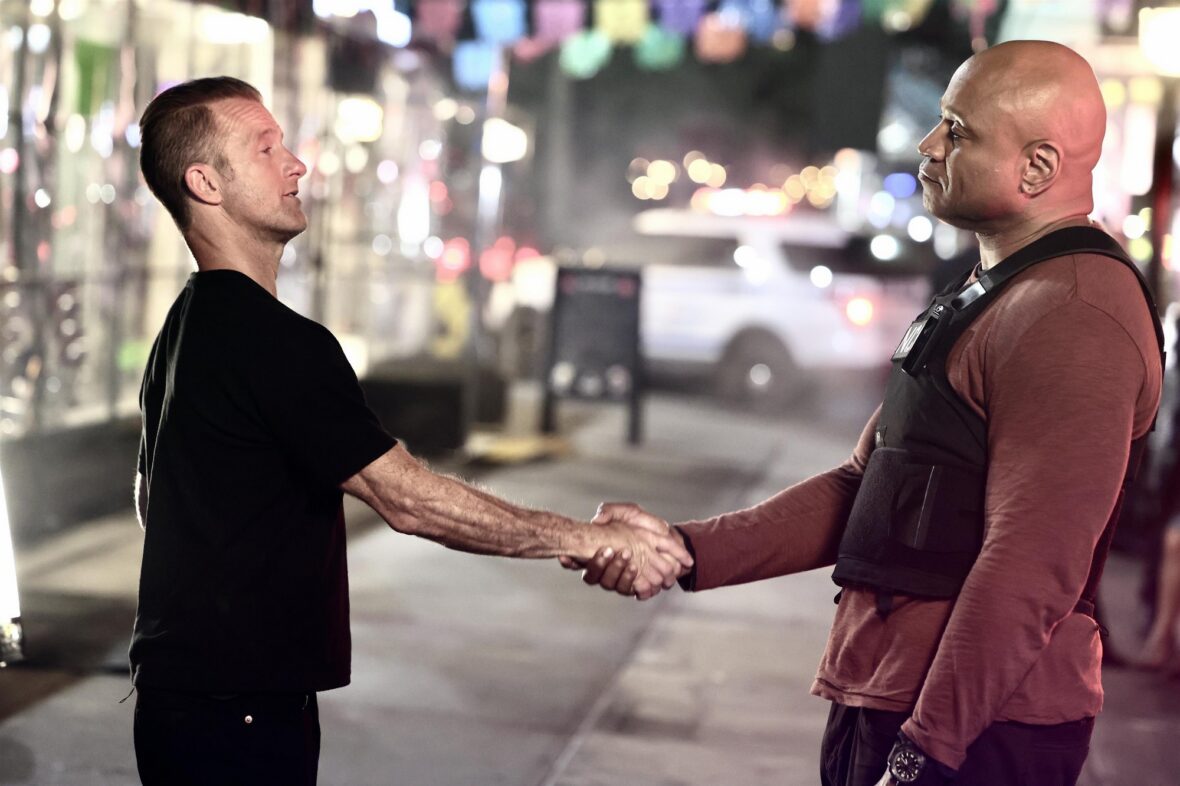 Scott Caan and LL Cool J shake hands in 'NCIS: New York' on set filming photo
