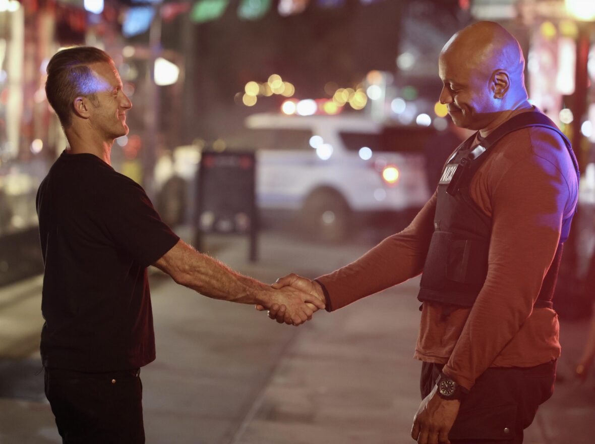 Scott Caan and LL Cool J shake hands in 'NCIS: New York' on set filming photo