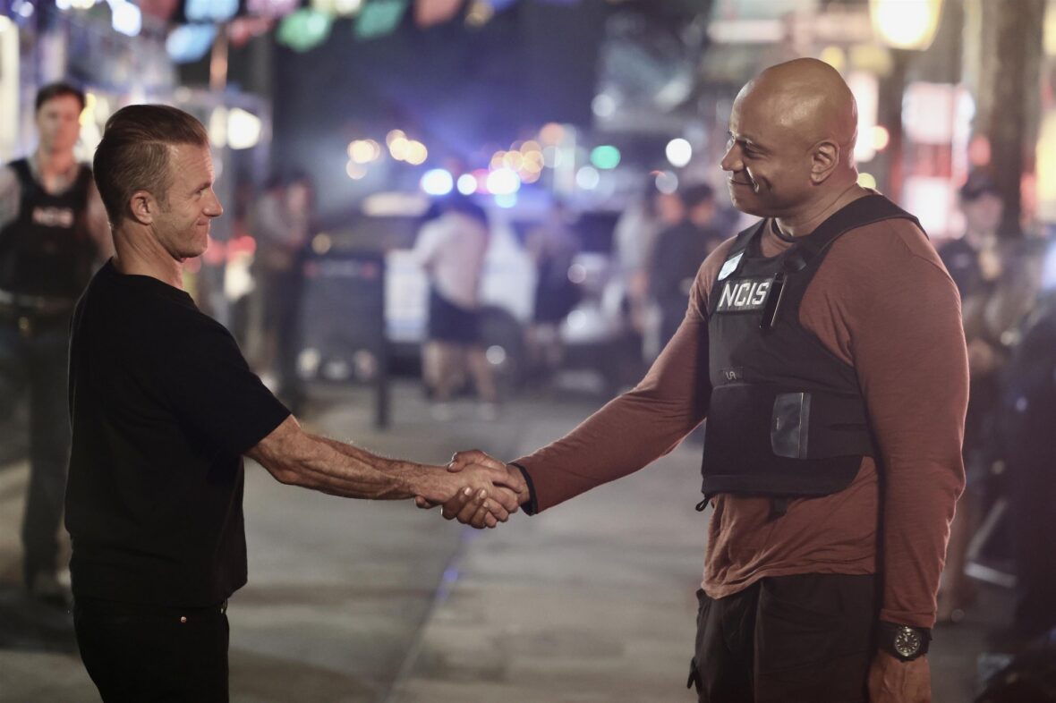 Scott Caan and LL Cool J shake hands in 'NCIS: New York' on set filming photo