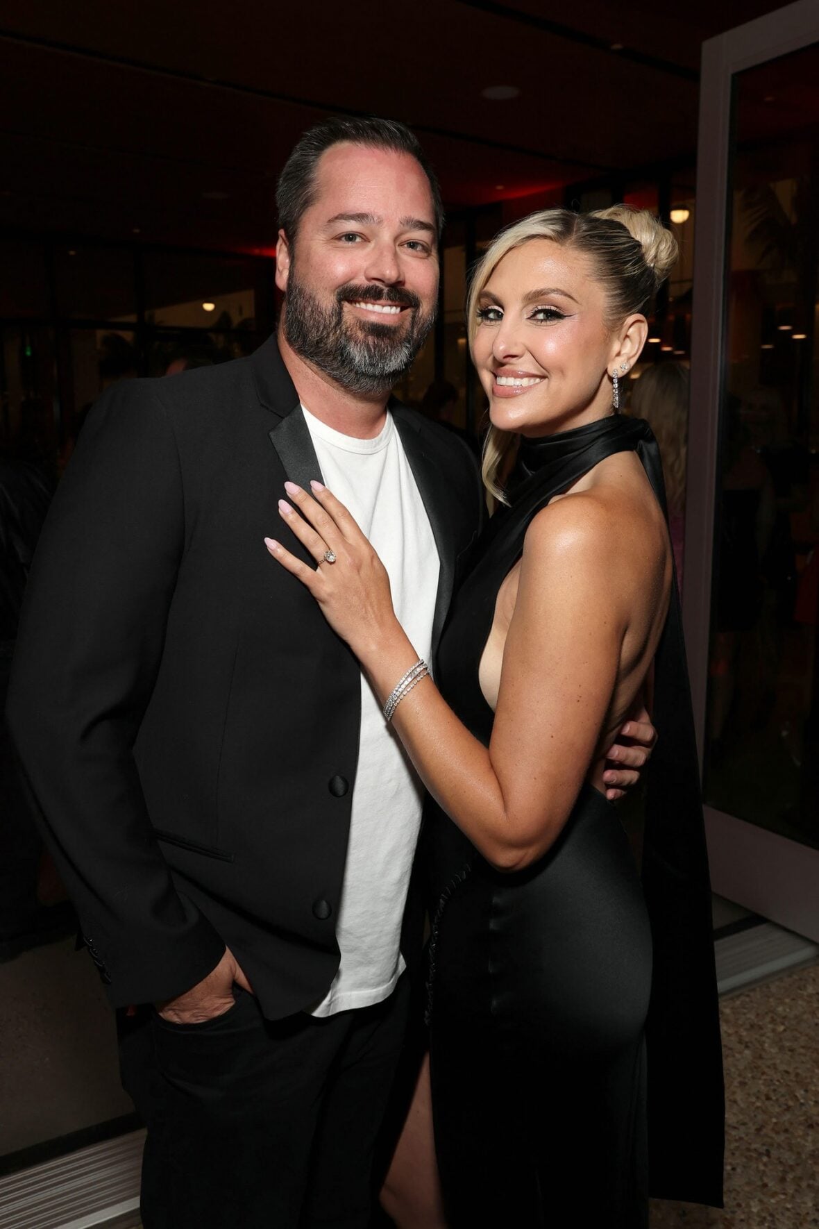 Travis Mullen and Gina Kirschenheiter at the RHOC season 20 premiere party