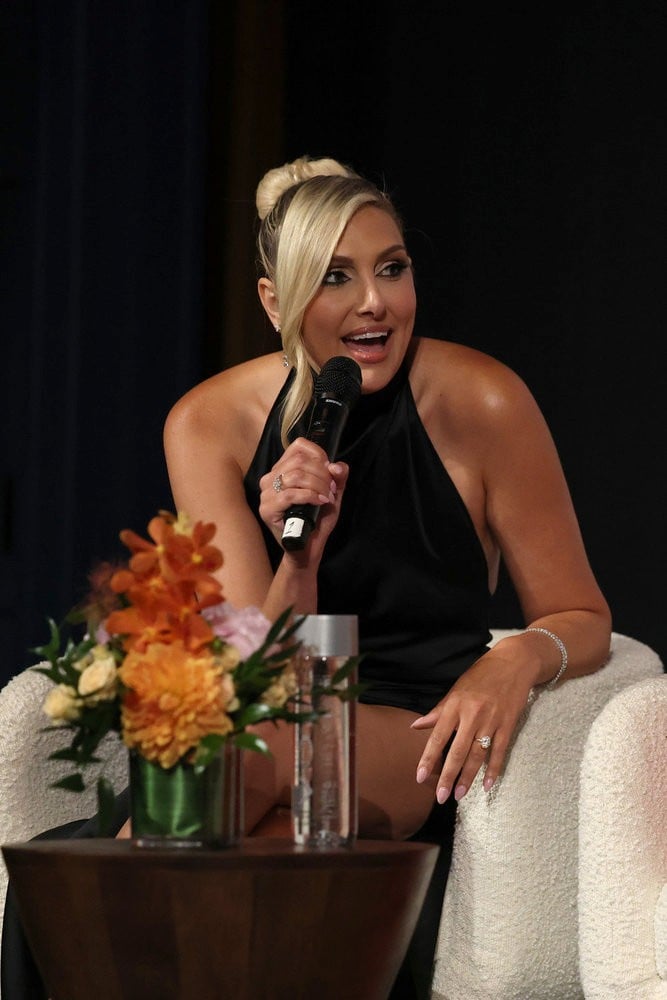 Gina Kirschenheiter on stage at the RHOC season 20 premiere party