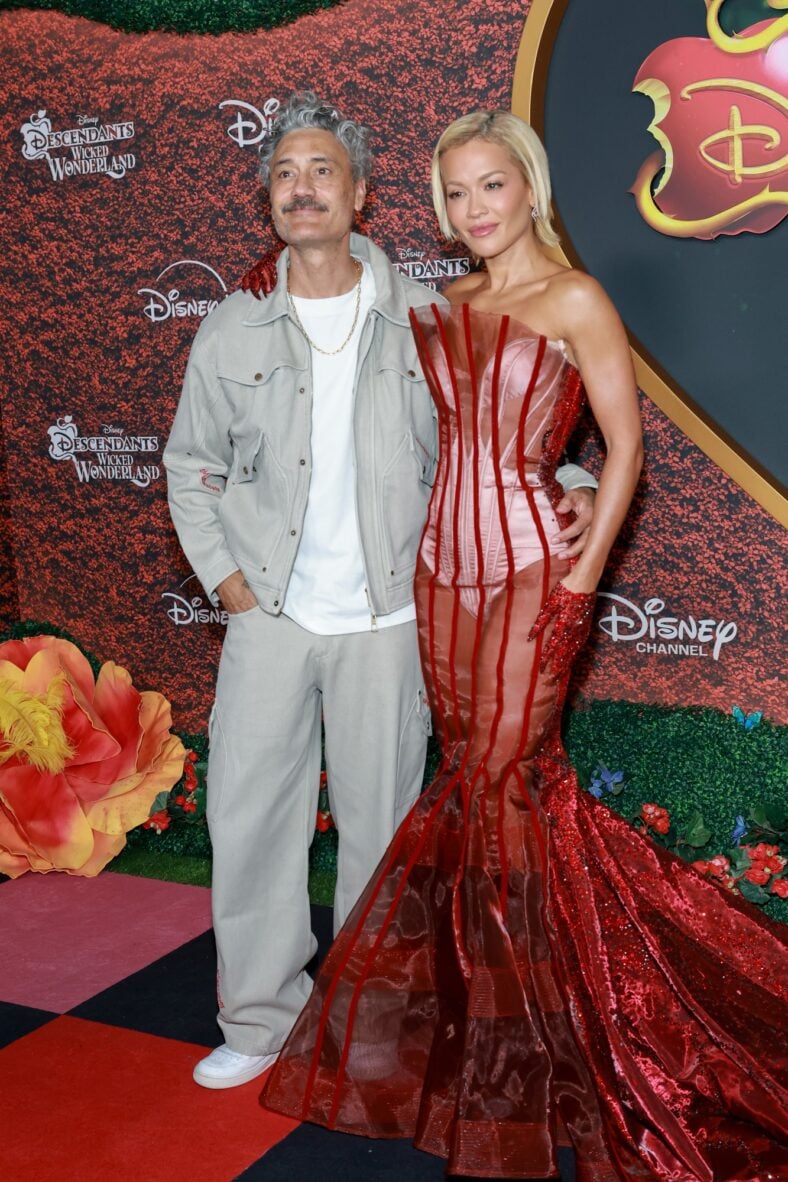 Taika Waititi and Rita Ora pose at the Descendants: Wicked Wonderland premiere