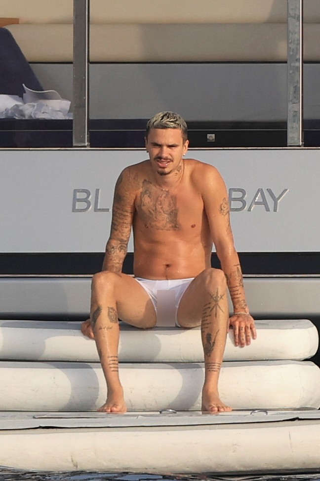 Beckham family yacht day, including shirtless Romeo and David Beckham, in Ibiza, Spain