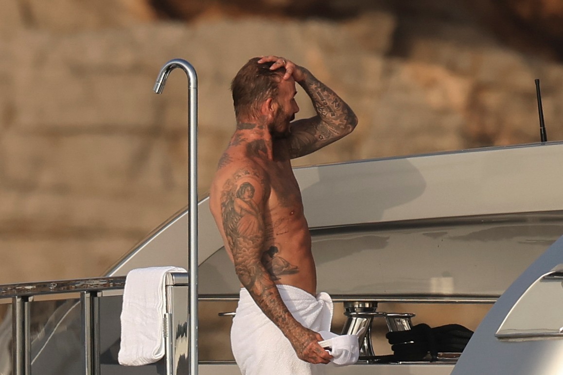 Beckham family yacht day, including shirtless Romeo and David Beckham, in Ibiza, Spain