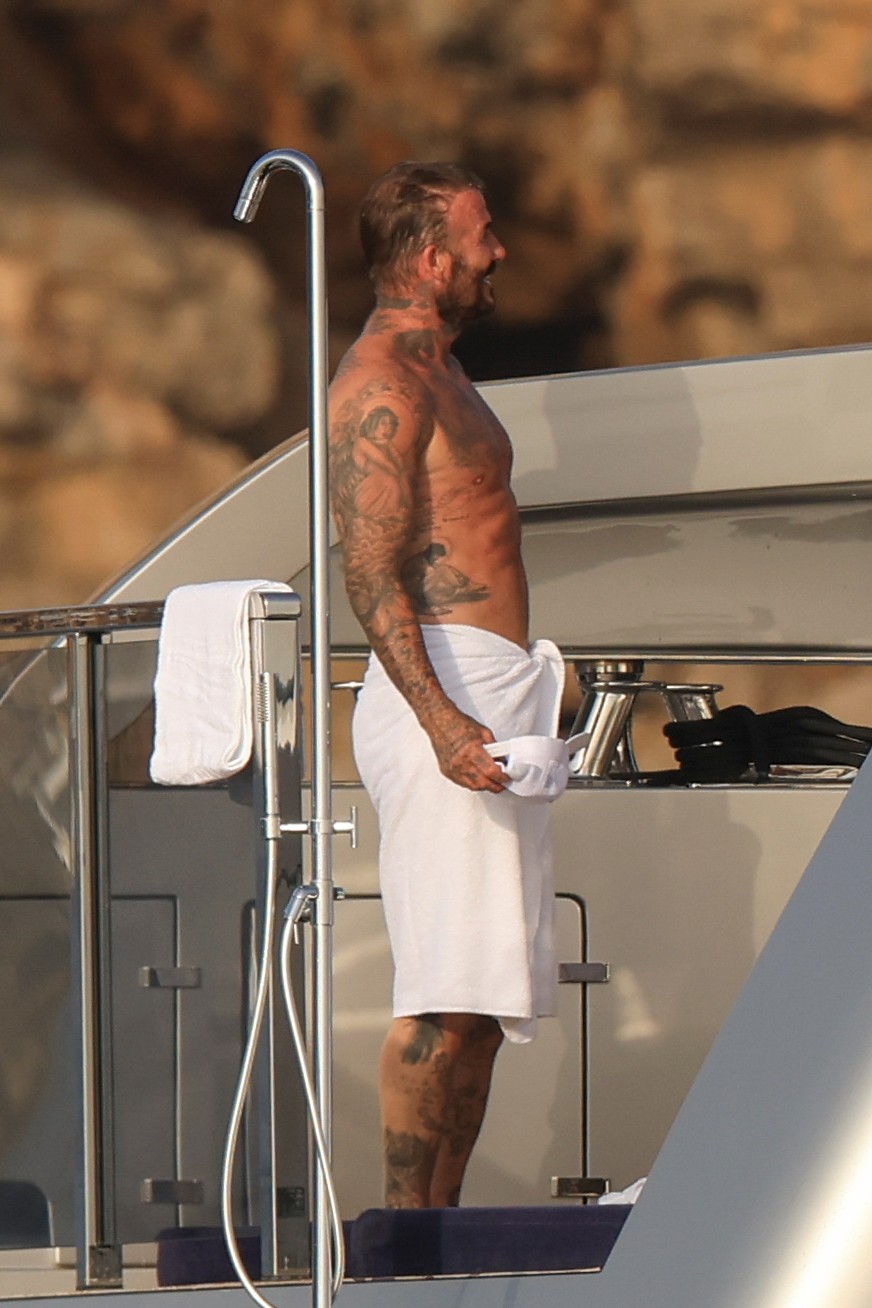 Beckham family yacht day, including shirtless Romeo and David Beckham, in Ibiza, Spain