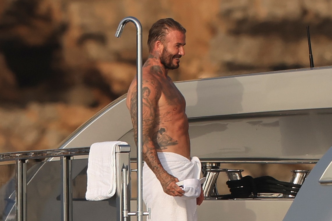 Beckham family yacht day, including shirtless Romeo and David Beckham, in Ibiza, Spain