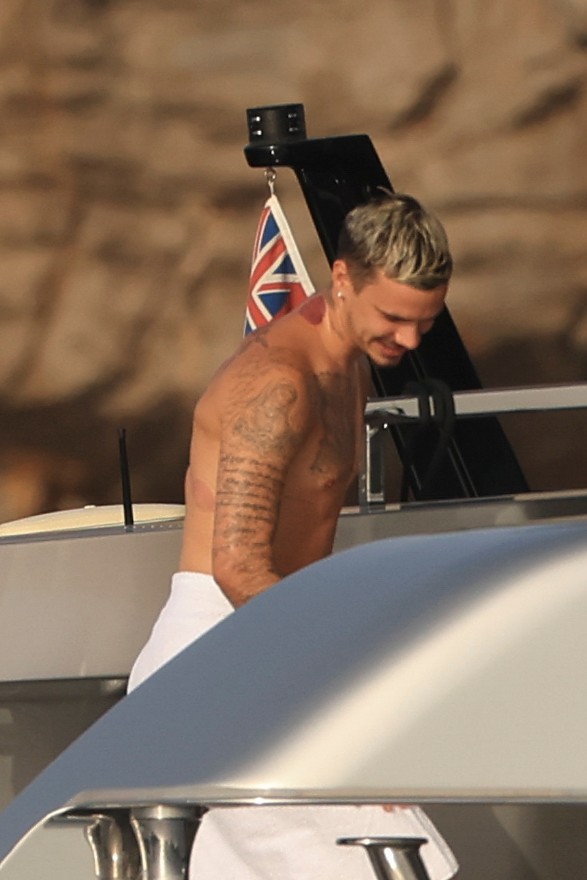 Beckham family yacht day, including shirtless Romeo and David Beckham, in Ibiza, Spain