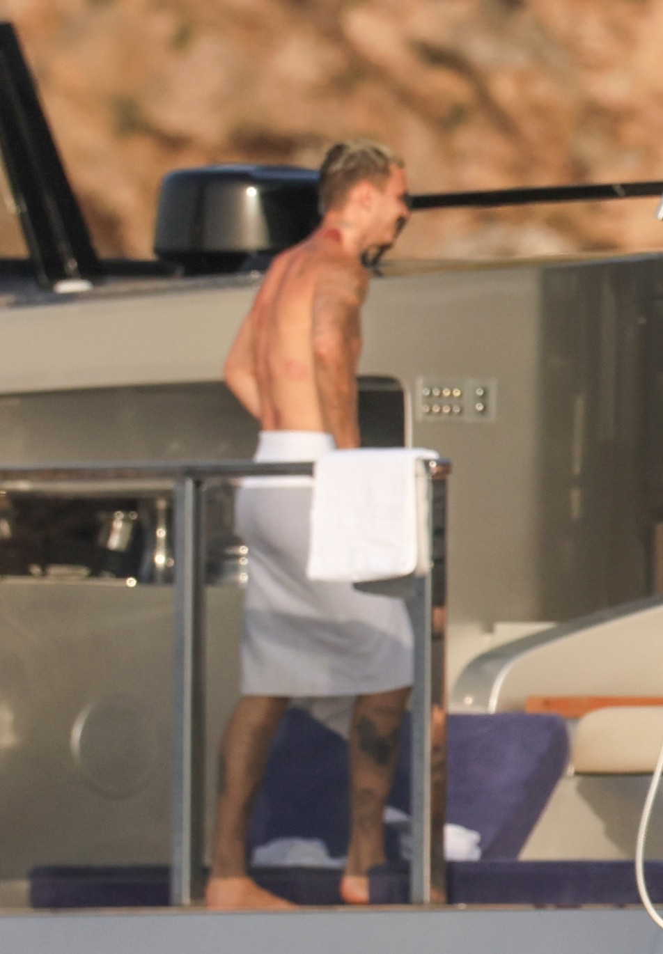 Beckham family yacht day, including shirtless Romeo and David Beckham, in Ibiza, Spain