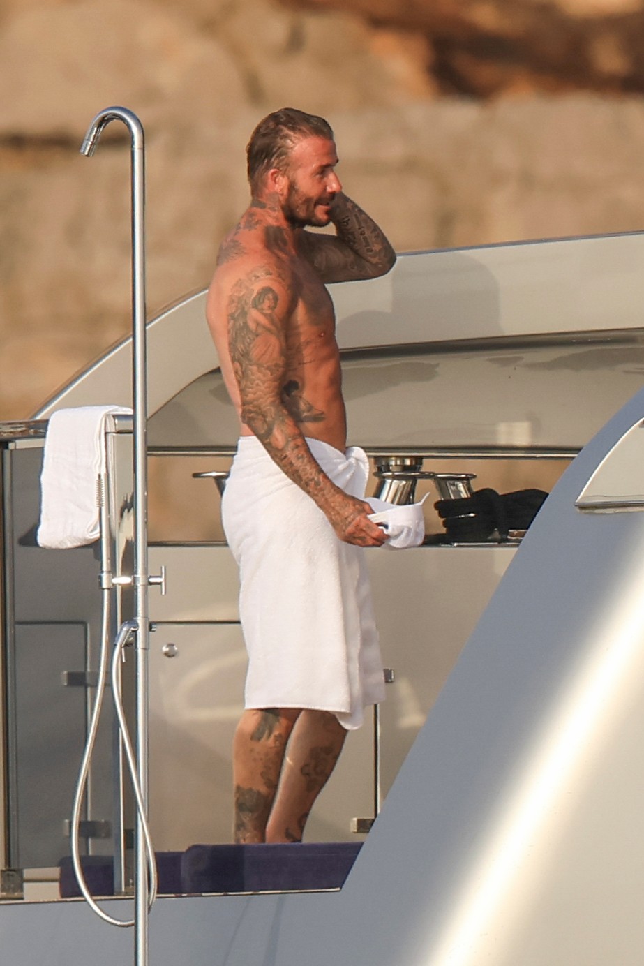 Beckham family yacht day, including shirtless Romeo and David Beckham, in Ibiza, Spain