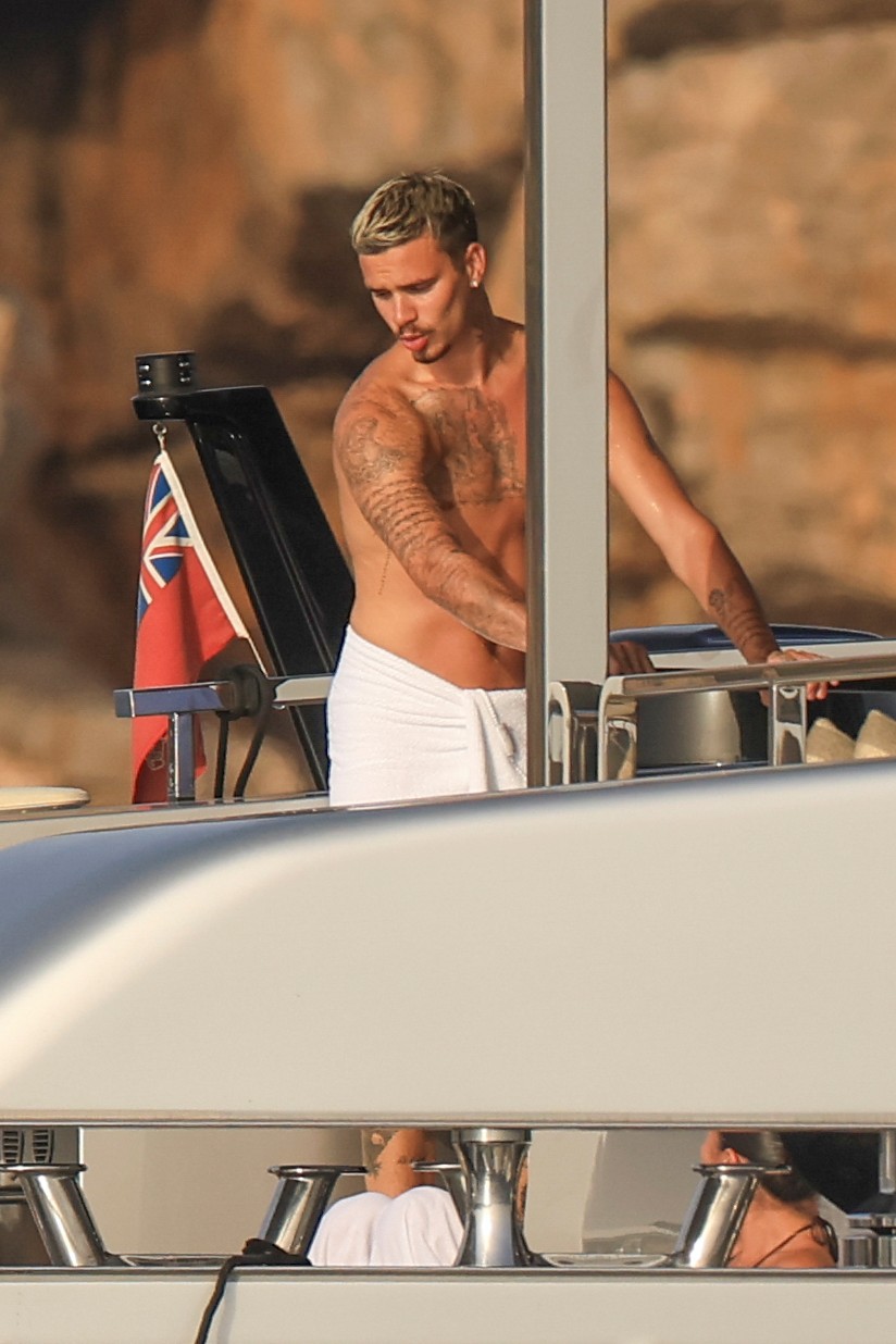 Beckham family yacht day, including shirtless Romeo and David Beckham, in Ibiza, Spain