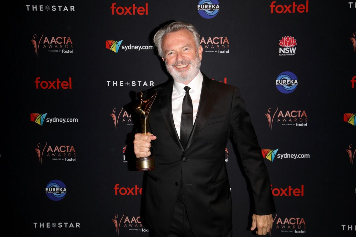 Sam Neill poses with his trophy at the 2019 AACTA Awards
