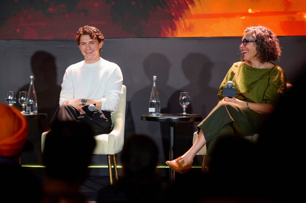 Tom Holland and Emma Thomas attend a Mumbai press conference for The Odyssey