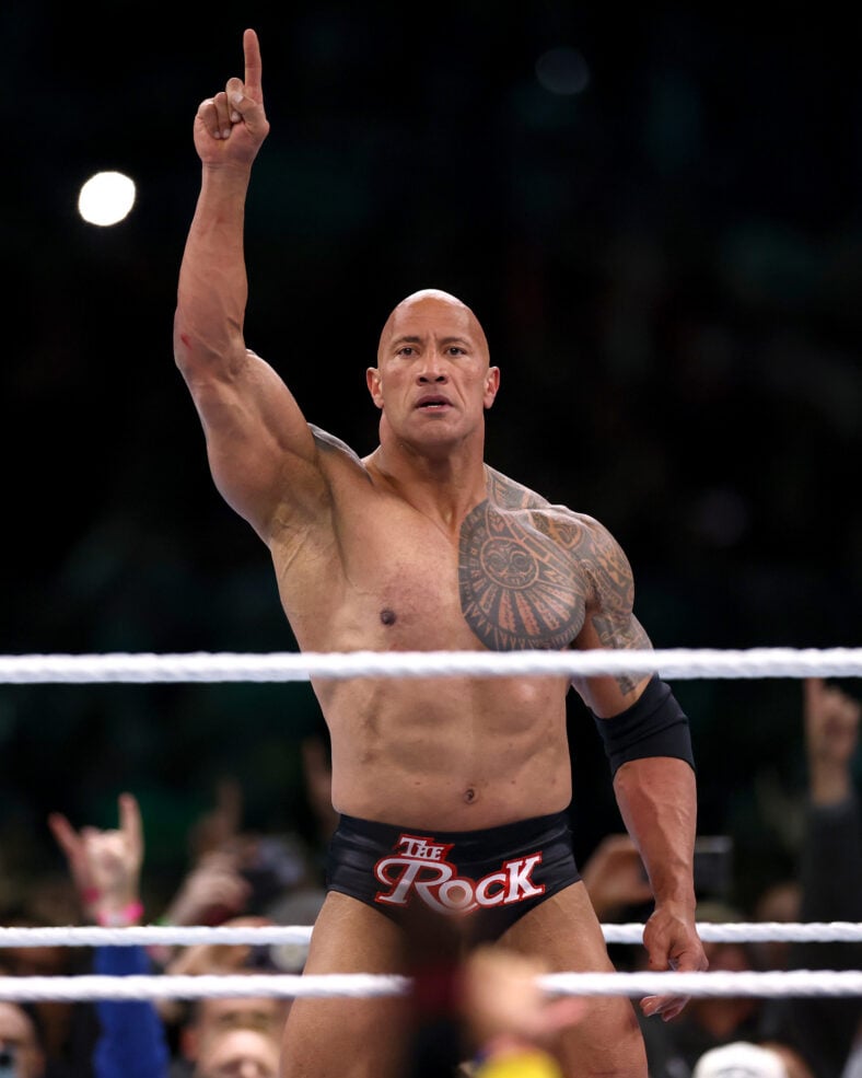 Dwayne Johnson shirtless in the wrestling ring in 2024