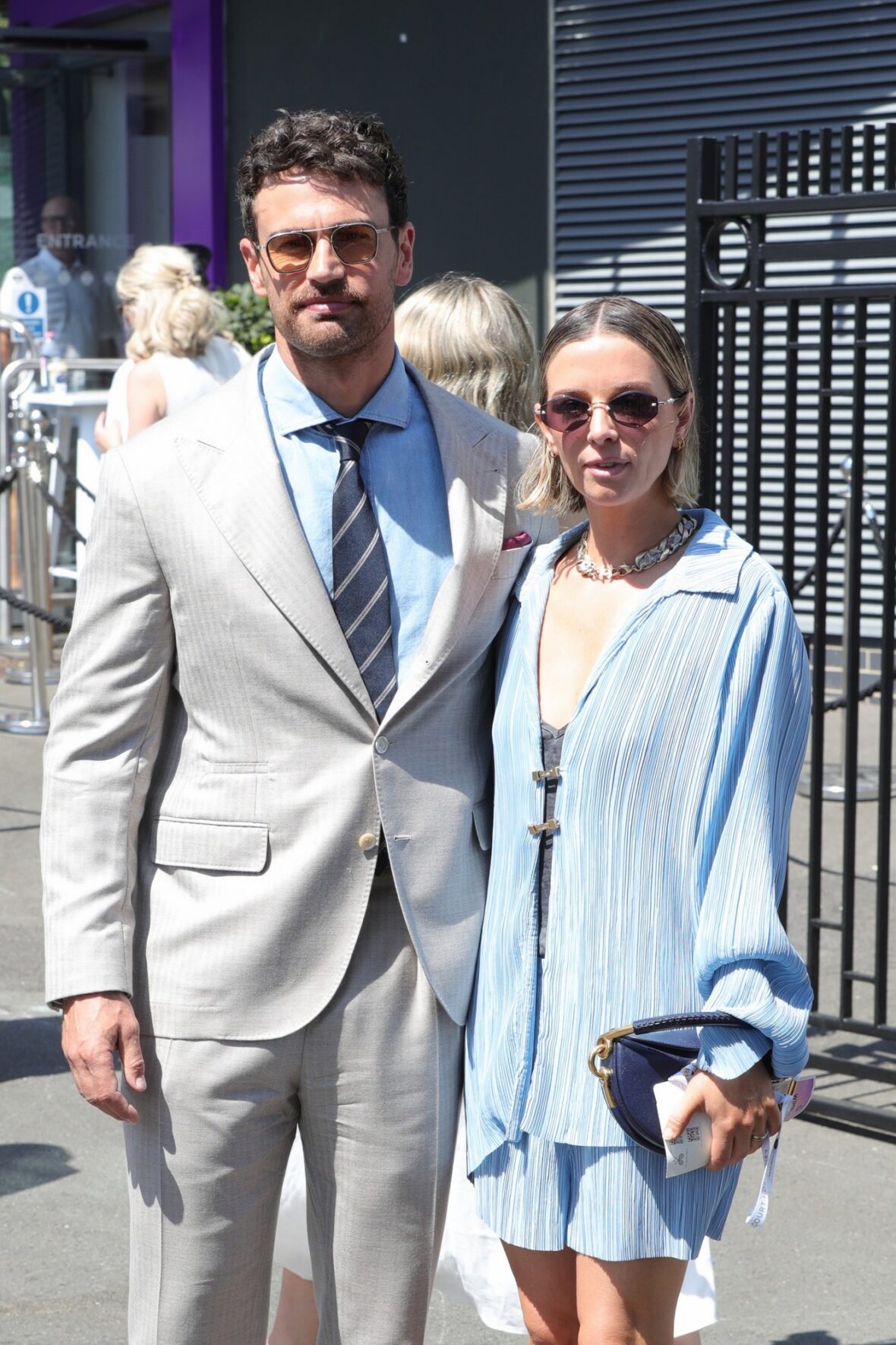 Theo James and Ruth Kearney arrive at Wimbledon on day 14 in London
