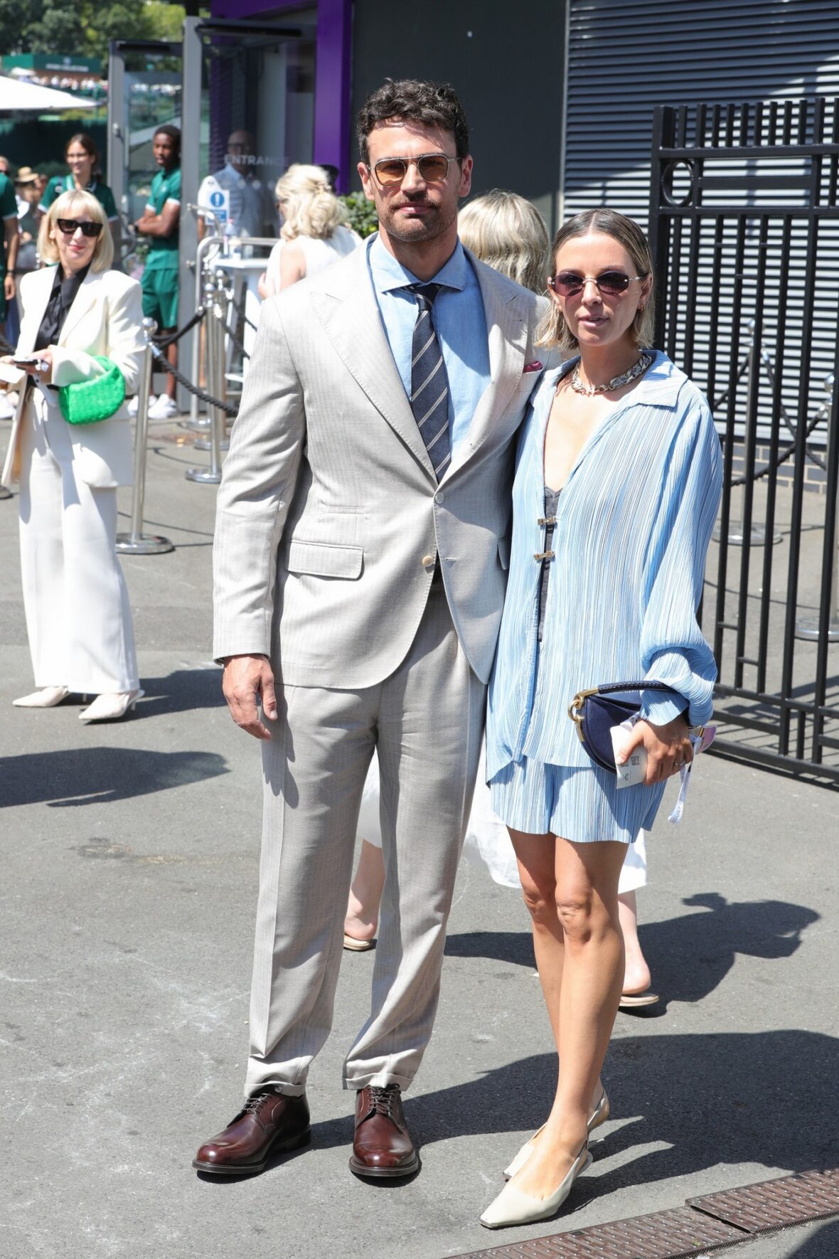 Theo James and Ruth Kearney arrive at Wimbledon on day 14 in London
