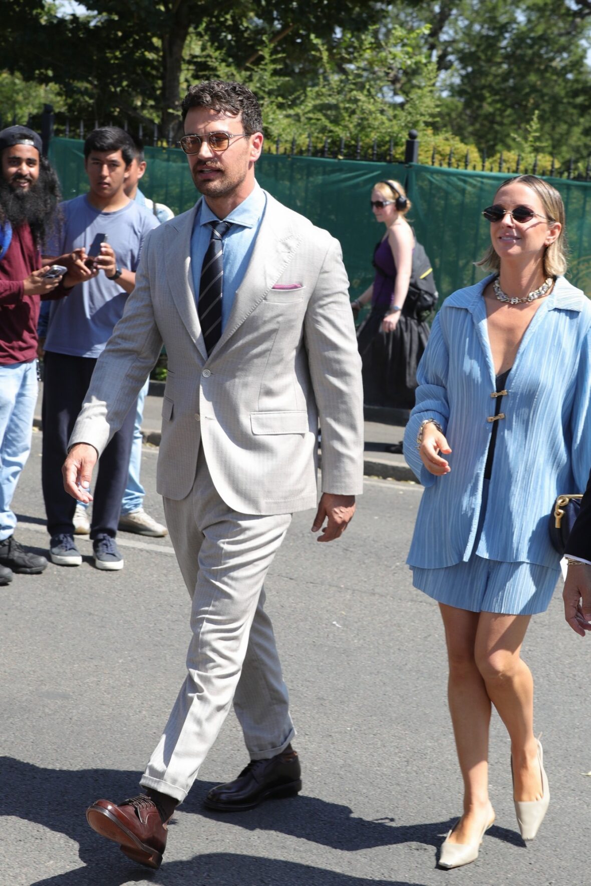 Theo James and Ruth Kearney arrive at Wimbledon on day 14 in London