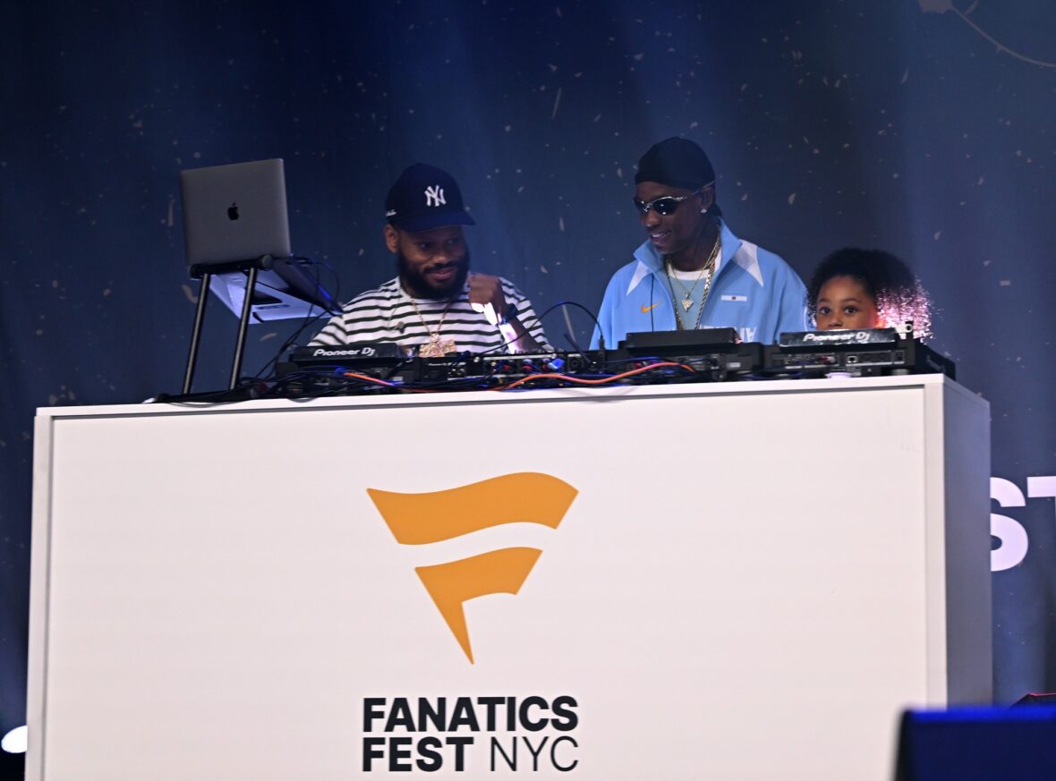 Stormi Webster joins dad Travis Scott behind the DJ booth at Fanatics Fest
