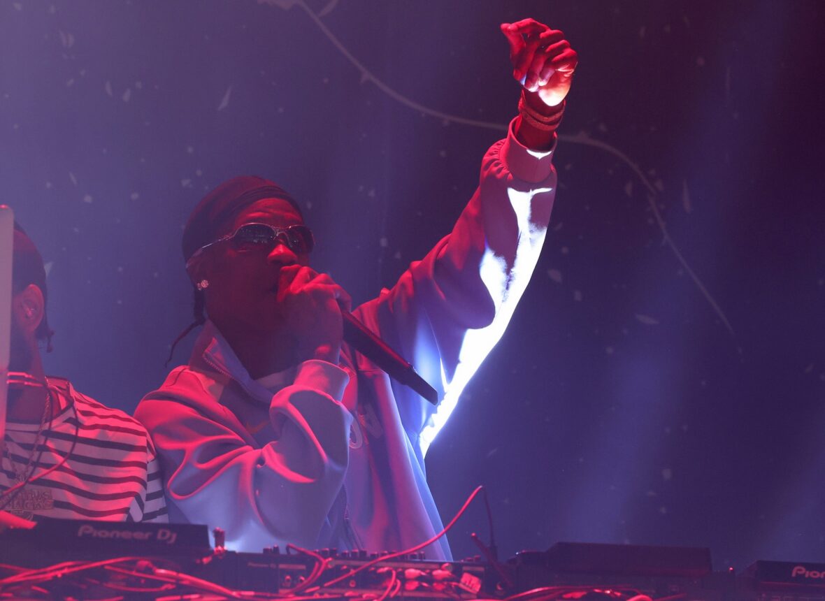 Travis Scott performs on stage at Fanatics Fest
