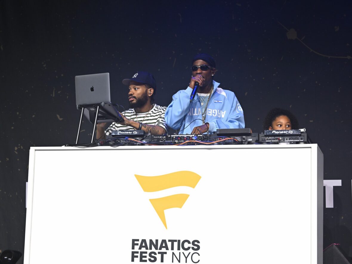 Stormi Webster joins dad Travis Scott behind the DJ booth at Fanatics Fest